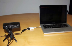 ��ô�ѱʼǱ���������ͶӰ�ǣ�